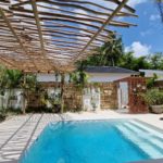 pool area with orchid garden