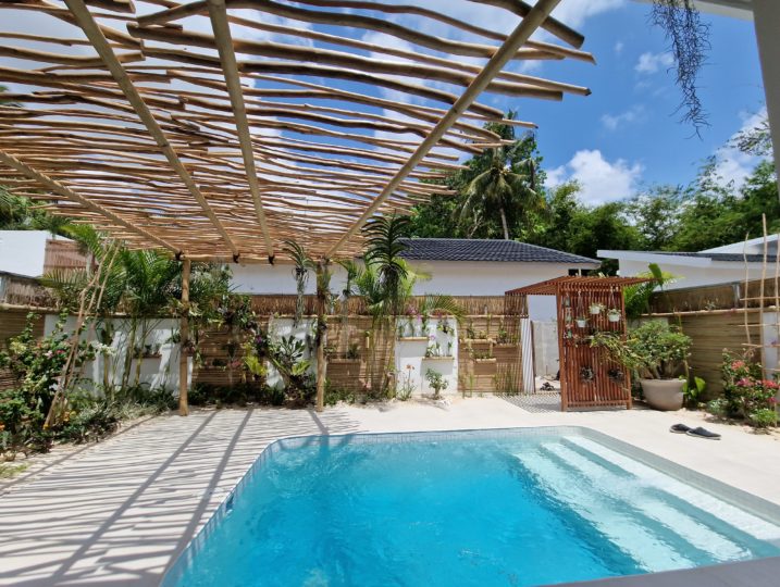 pool area with orchid garden