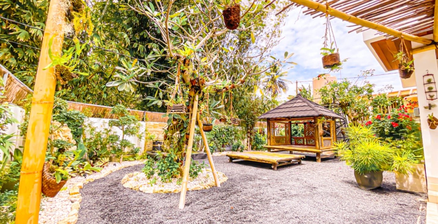 garden with pavillion, yoga platform and waterfall