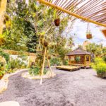 garden with pavillion, yoga platform and waterfall