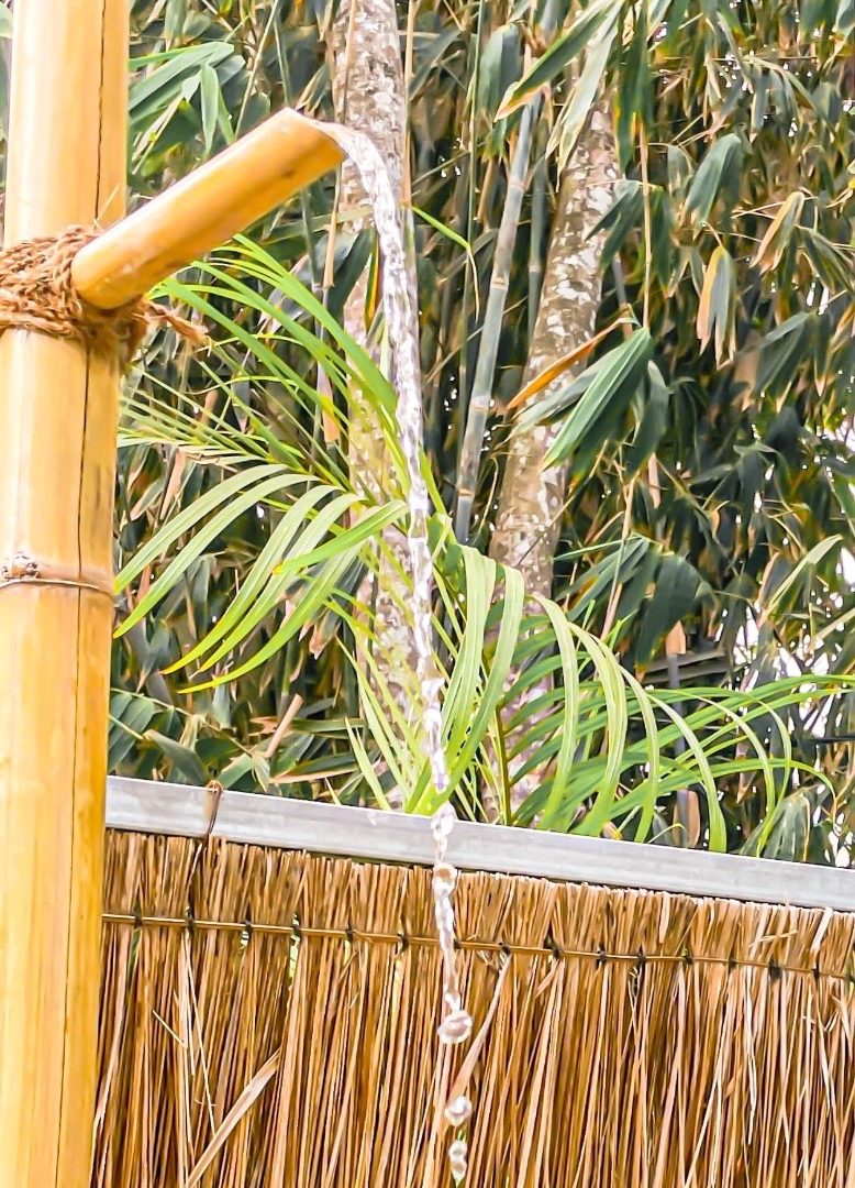 bamboo outdoor shower in pool area